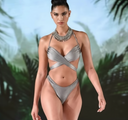 Woman wearing a silver bikini with a tropical background